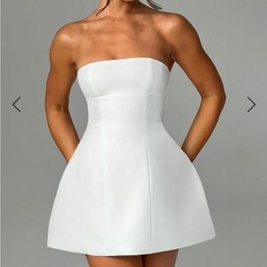Strapless mini ivory dress. Worn once for 2 hrs for wedding in Vegas